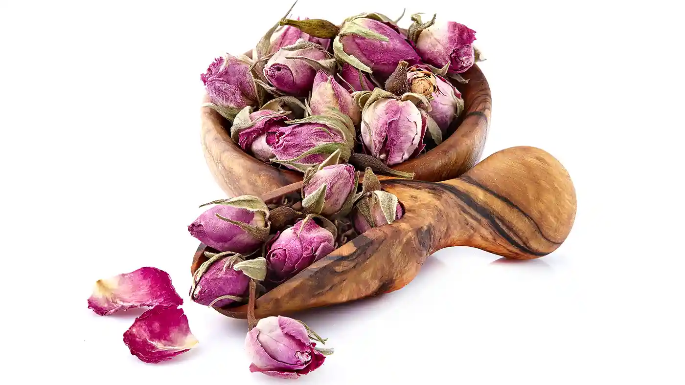 Dried Roses in wooden bowl