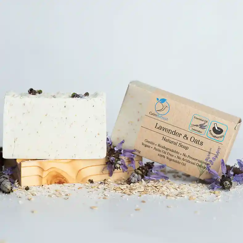 Lavender and Oats Soap on soap dish next to soap box